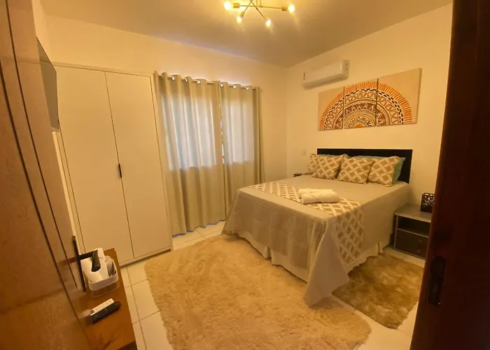 APARTAMENTO COM SUITE EM CONDOMÍNIO FECHADO com estacionamento próprio Porto Seguro